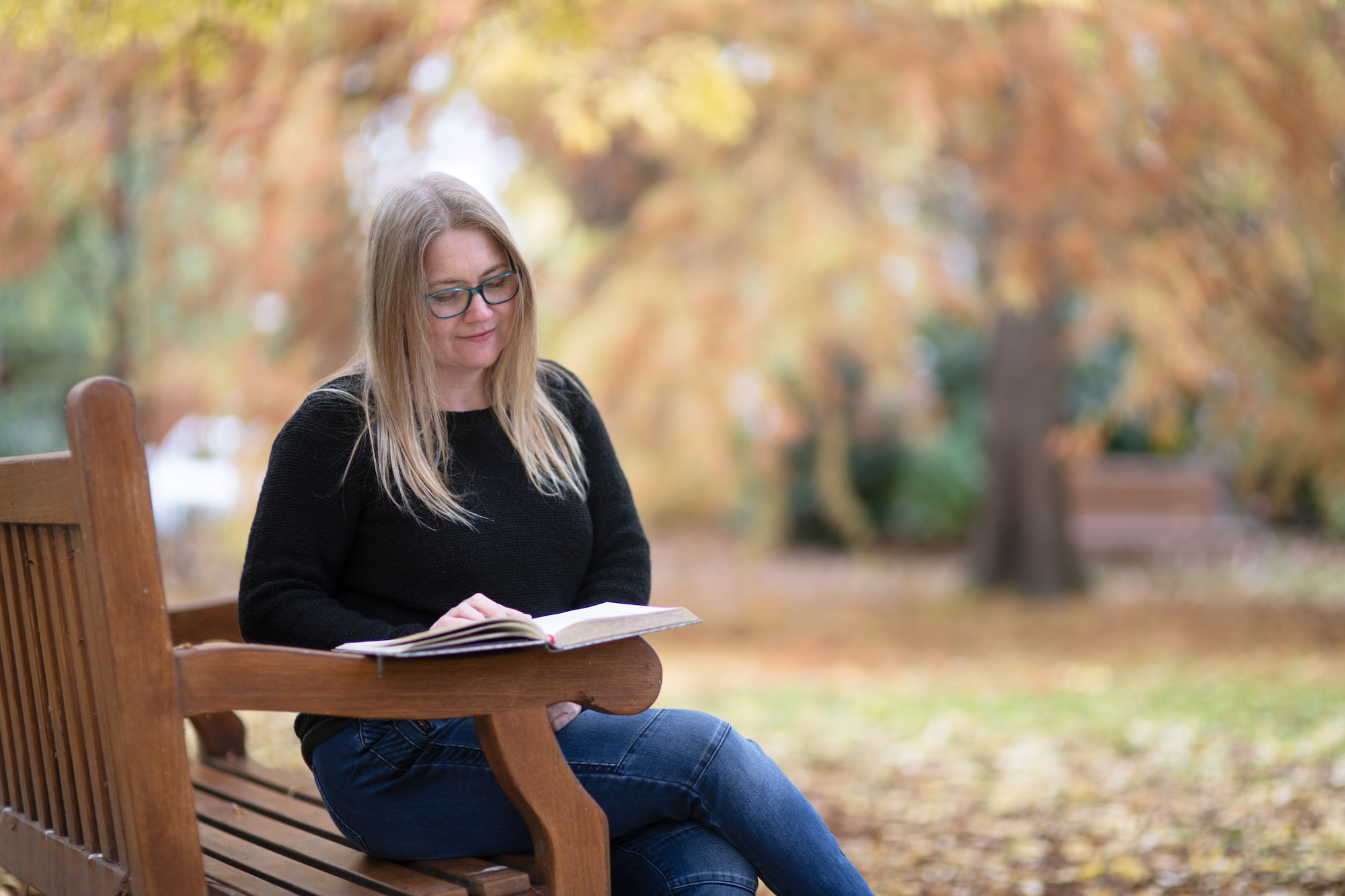 Selina Shapland on bench seat in Albury Botanic Gardens